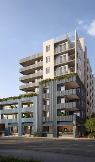 CGI rendering of a new multi-story apartment building on a city street, distinguished by its blue podium and lighter, stepped residential tower above.